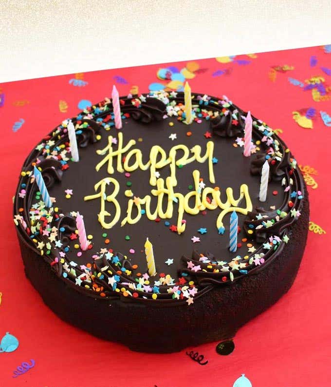 A chocolate birthday cake with 